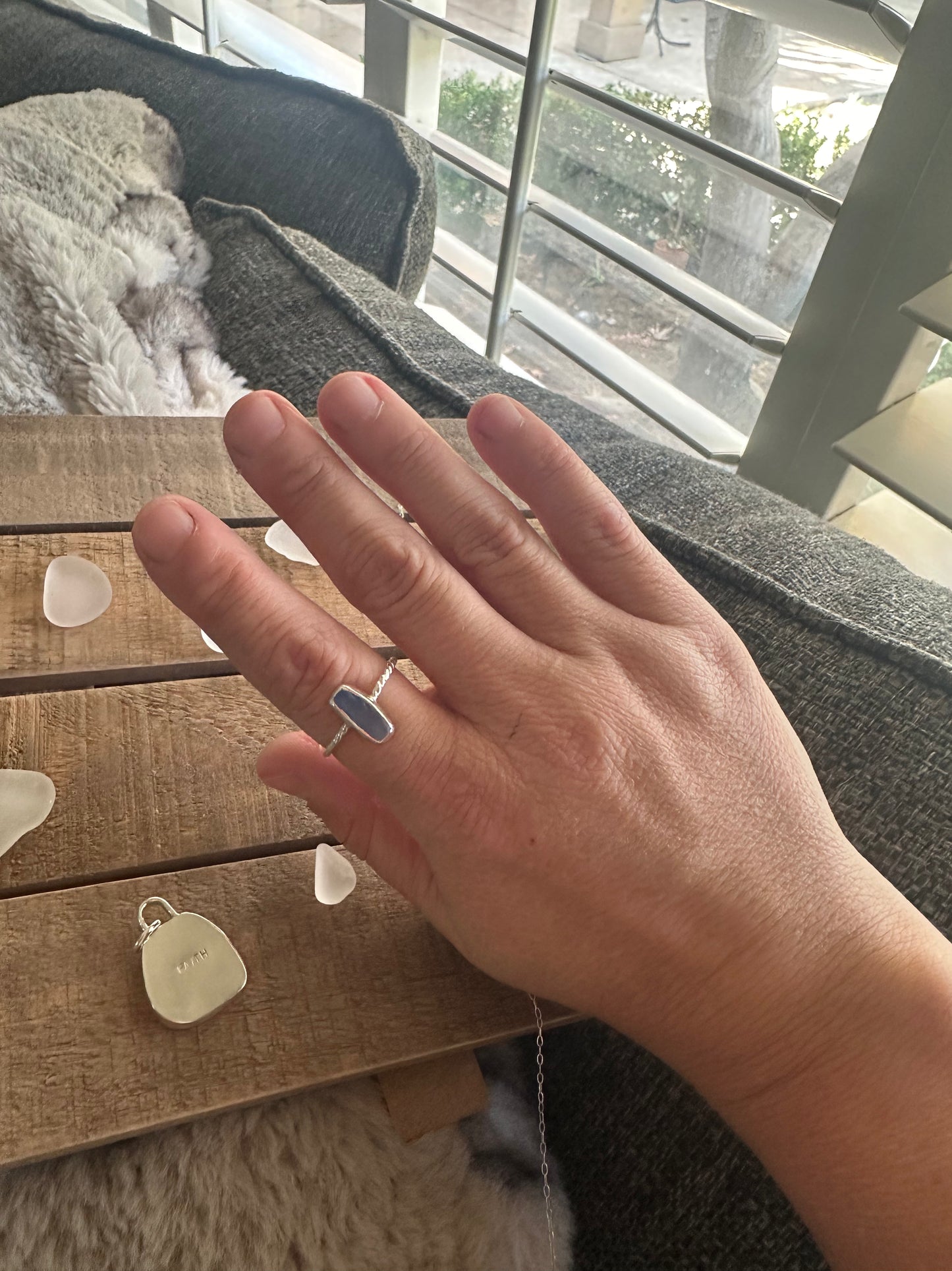 T light blue ring