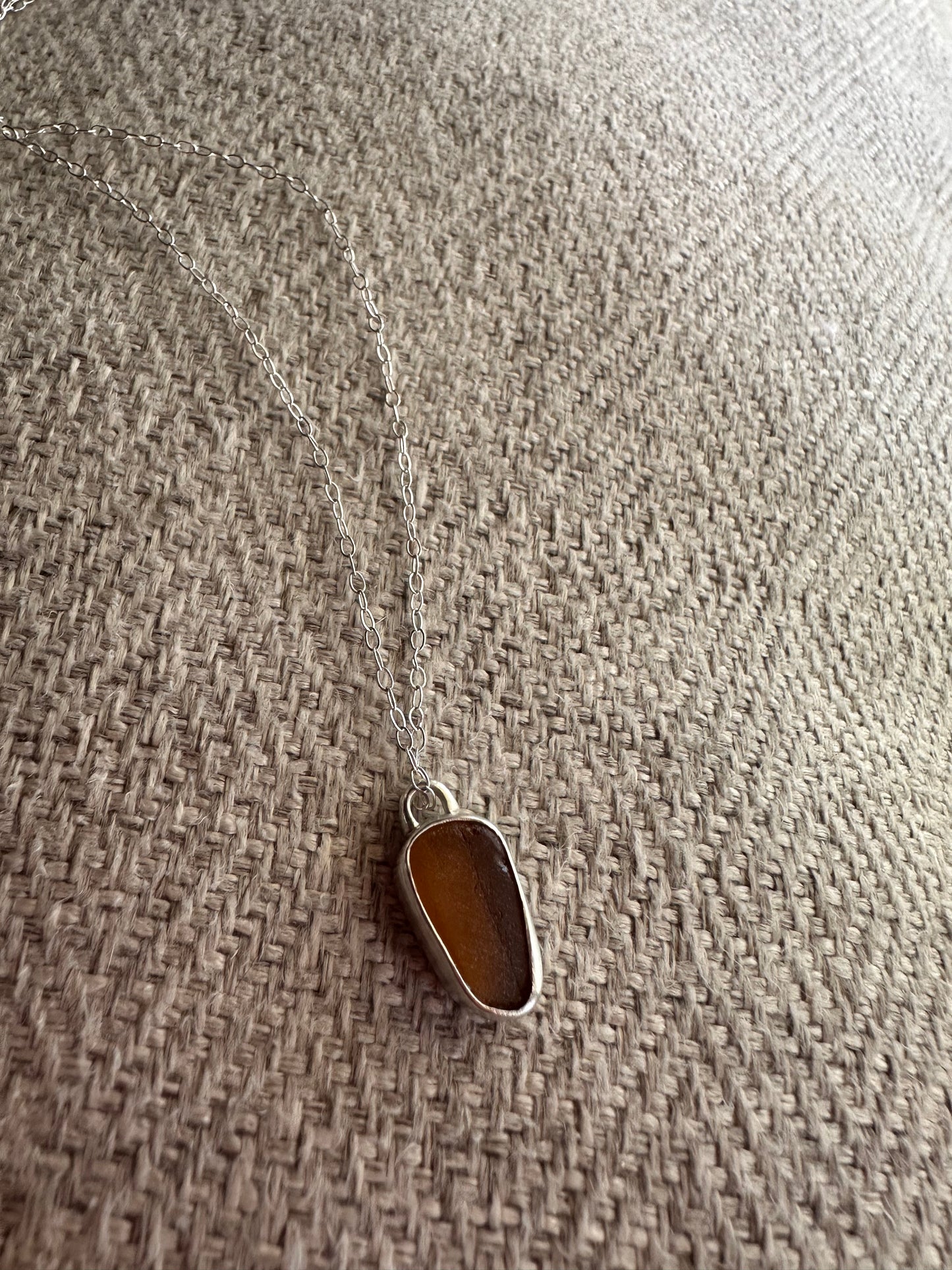 Amber seaglass pendant (chain not included)