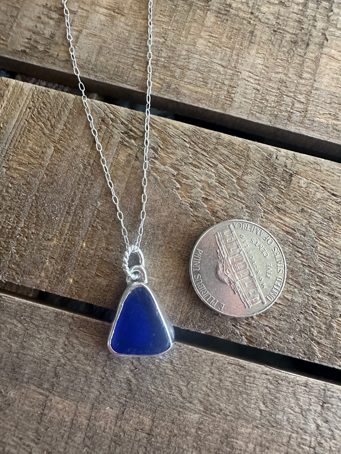 Cobalt blue seaglass Pendant with cross stamp